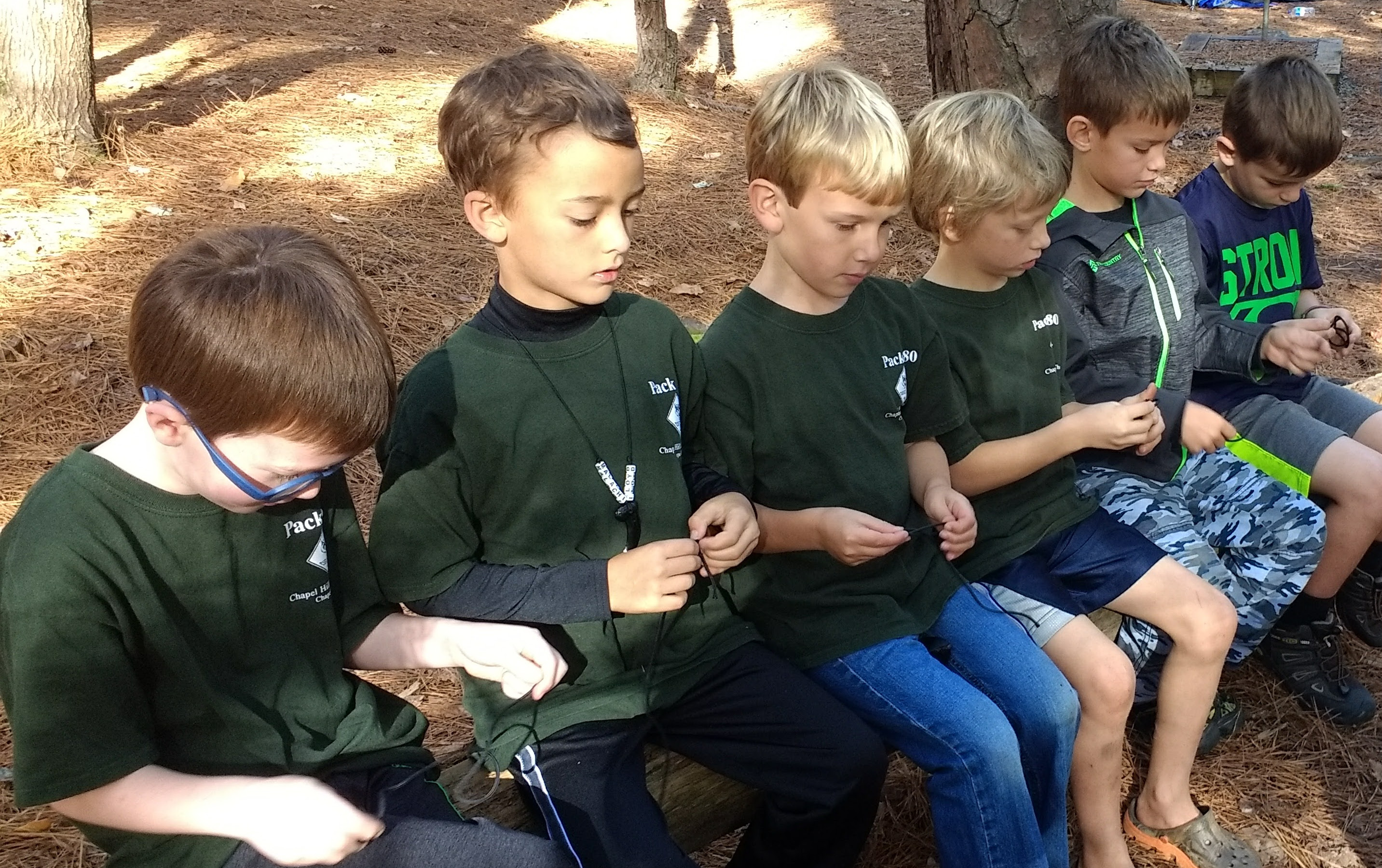 scouts practicing knots